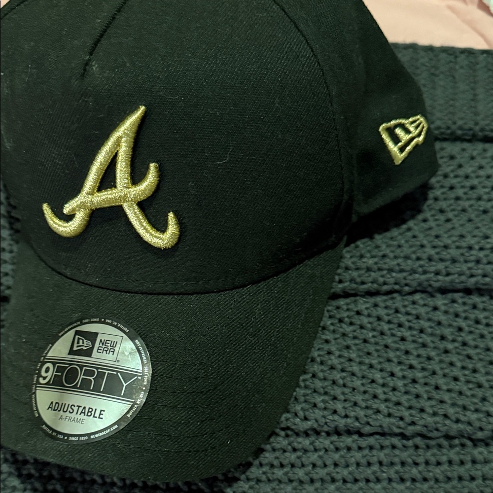New Era Black Cap with Gold Logo